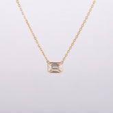 bezel-set-emerald-diamond-necklace-sustainable-gold