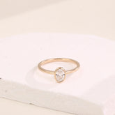 gold-bezel-oval-diamond-ring