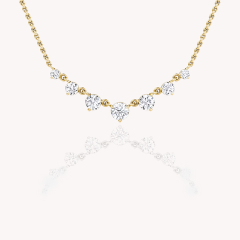 Seven Round Diamond Graduated Necklace In Yellow Gold