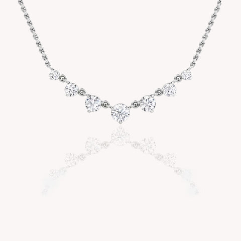 Seven Round Diamond Graduated Necklace In White Gold