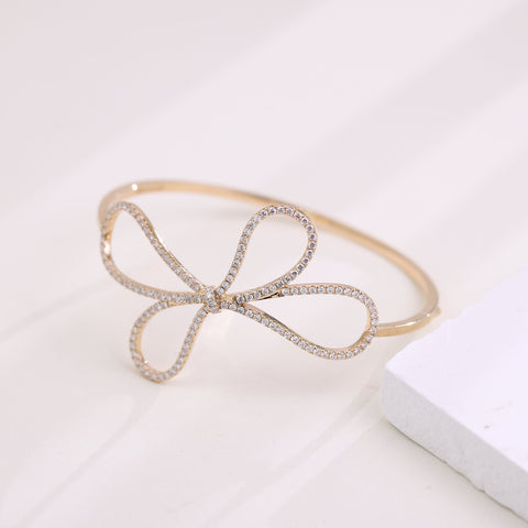 fiore-bow-gold-diamond-bangle