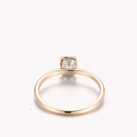 gold-bezel-emerald-diamond-ring
