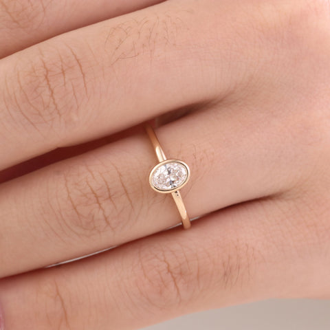 gold-bezel-oval-diamond-ring