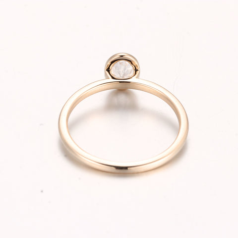 oval diamond gold bezel ring